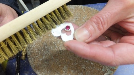 final polish to the back and sides of the pieces