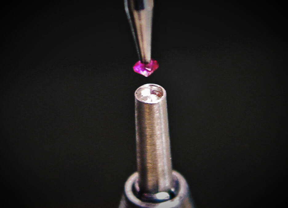 Set your gemstone in place with a burnishing tool