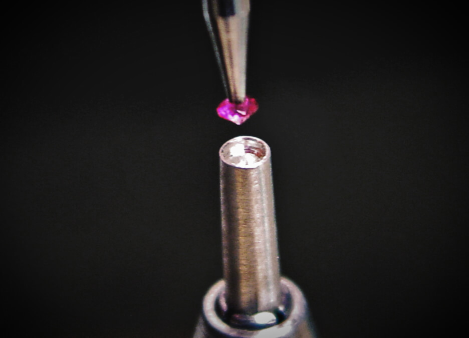 Set your gemstone in place with a burnishing tool