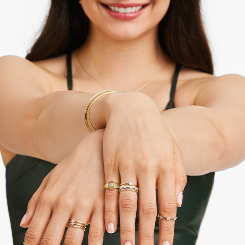 Yellow Gold Petite Solitaire Oval Cut Diamond Ring